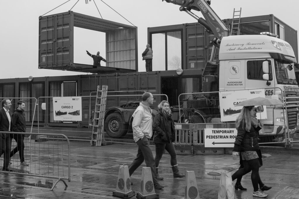 Crane lifting cargo container frame